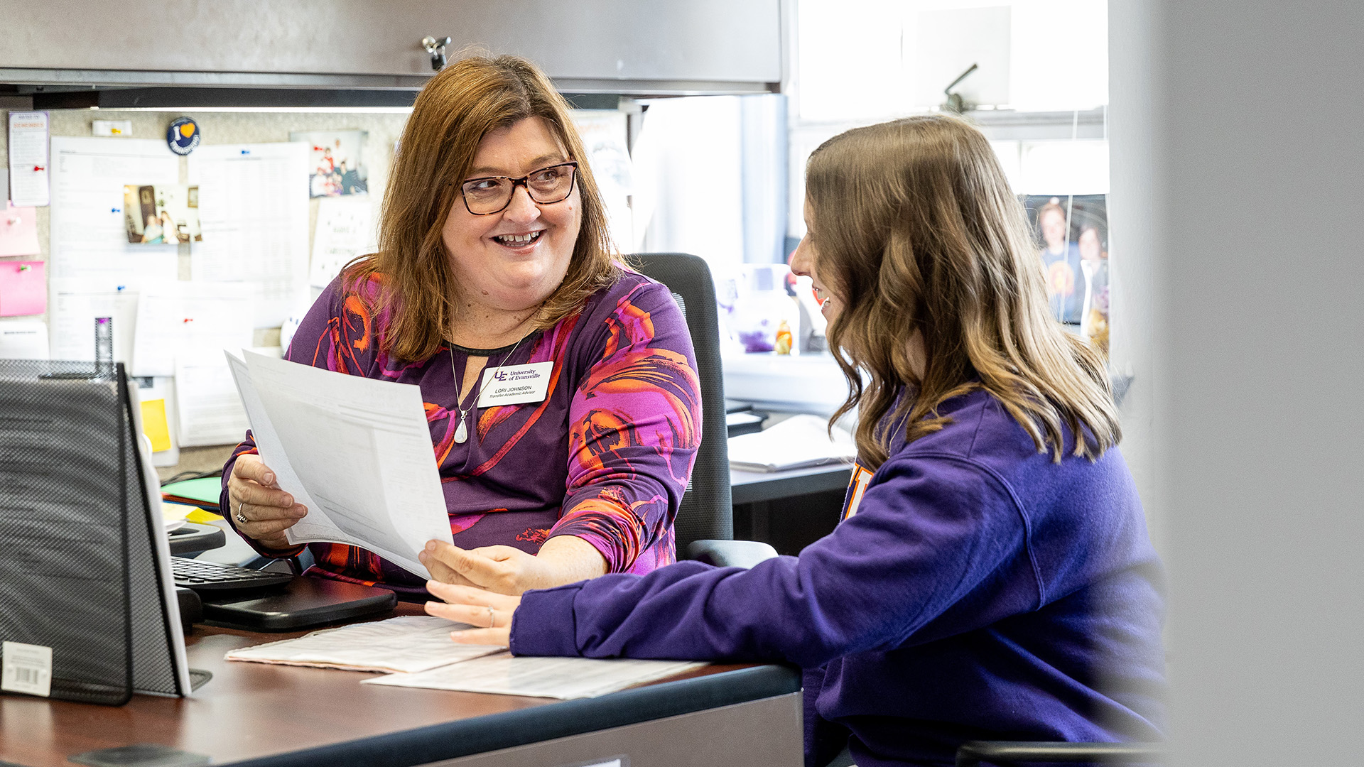 Advisor Lori Johnson with a student
