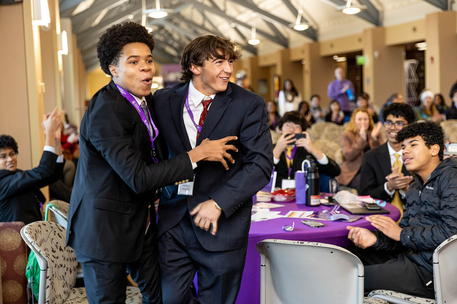 Team Helping Hands reacts to being named for the Top 10 round.