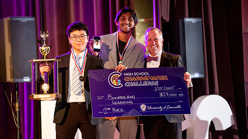 Boomerang Learning winners and PrezP holding check