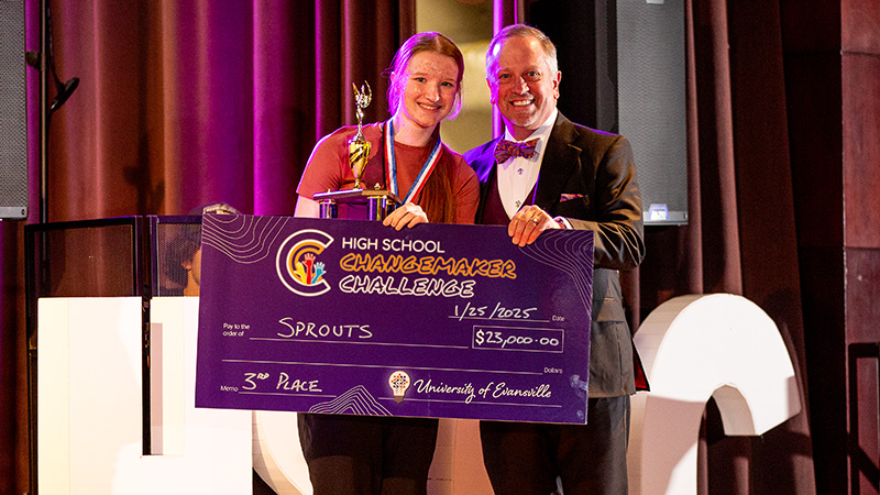 Sprouts winner and PrezP holding check