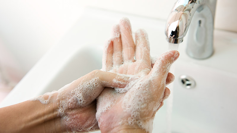 Person washing their hands