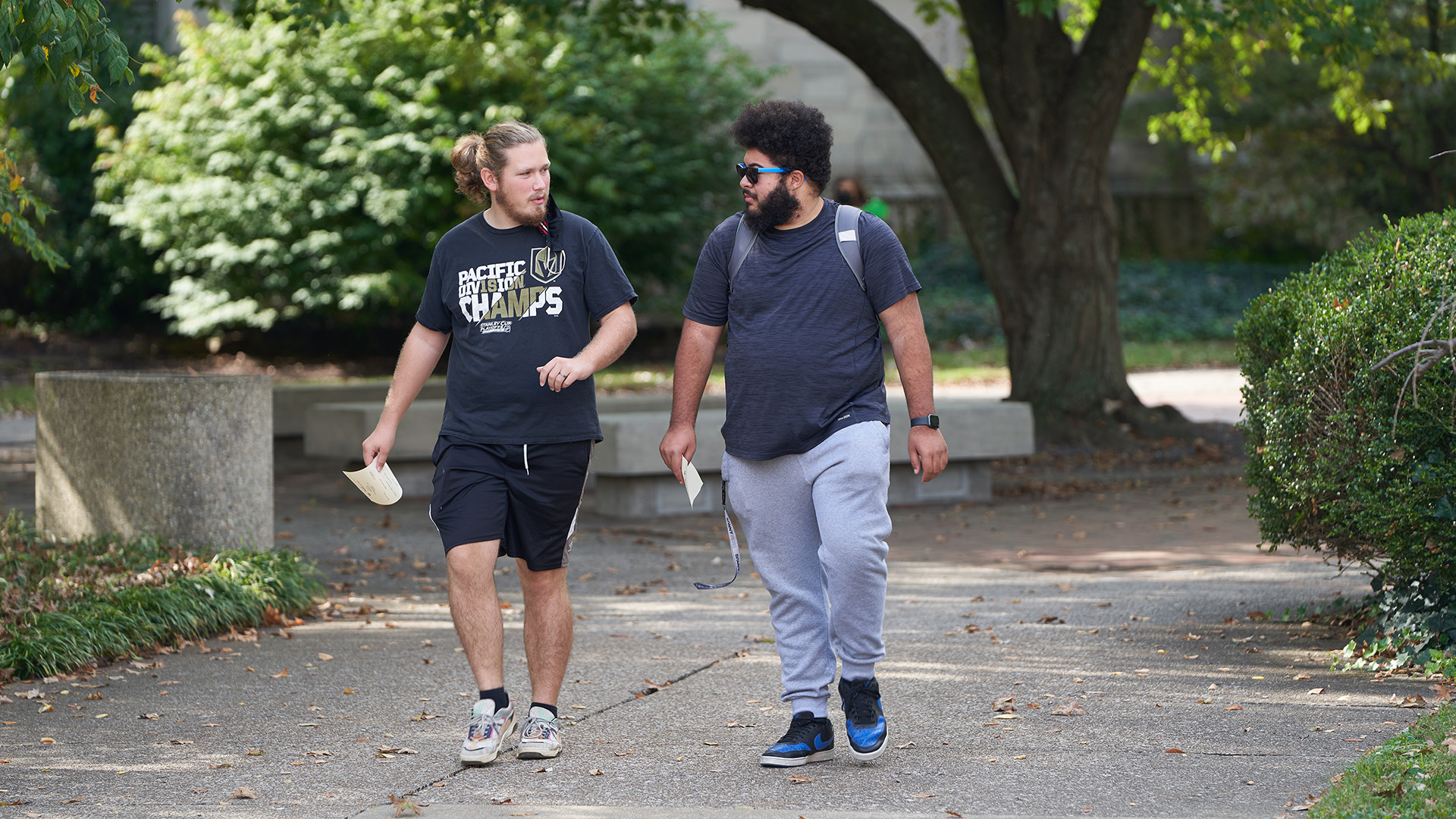 Two male students walking together