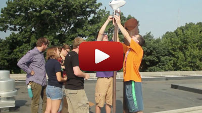 Students putting up wind gauge