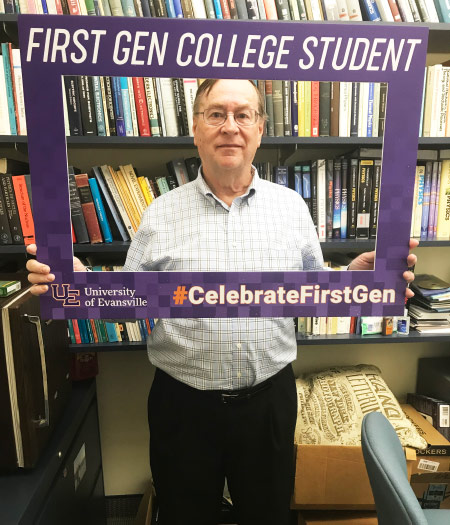 Dale holding First-gen sign