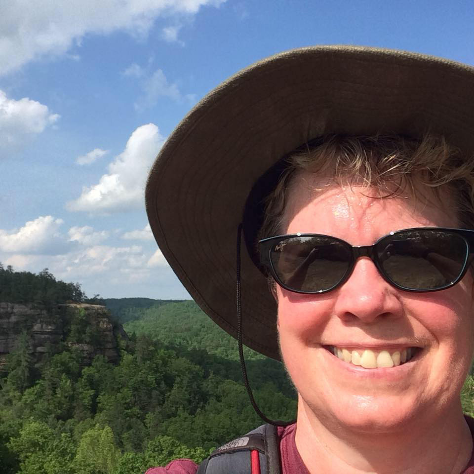 Elizabeth Powell in sun hat