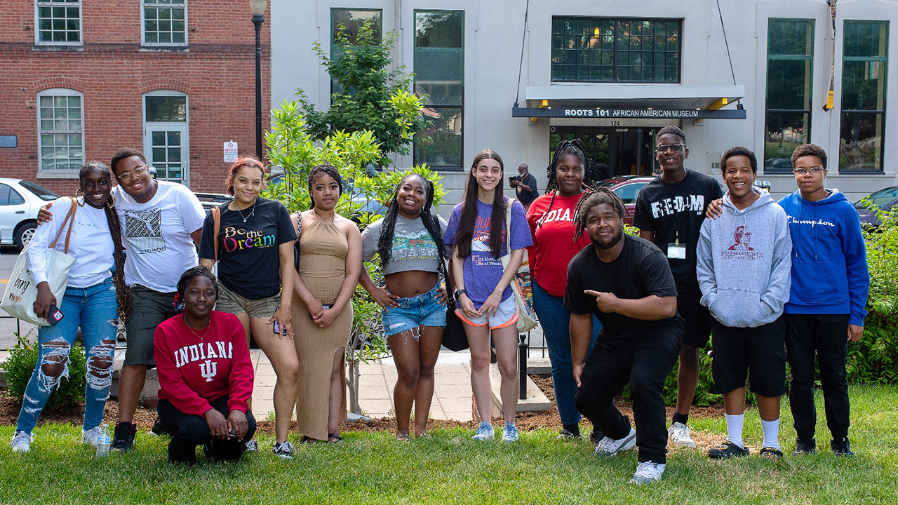 Diverse group of students outside the African American Museum