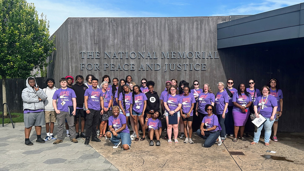 Students outside the National Museum of Peace and Justice