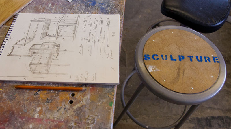 Art drawing with sculpture label stool