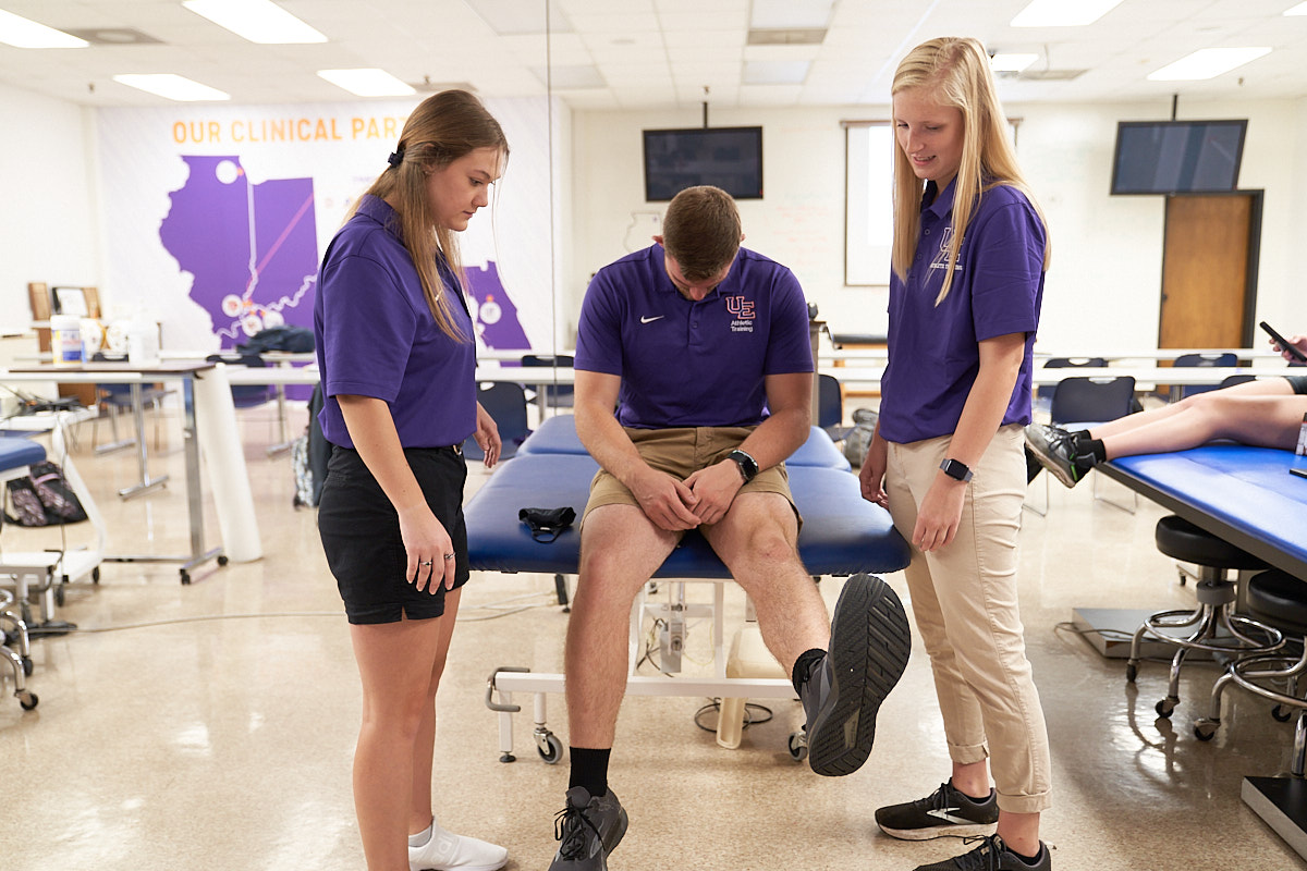 Athletic Training student lifting foot