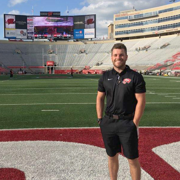 Morgan standing on the football field