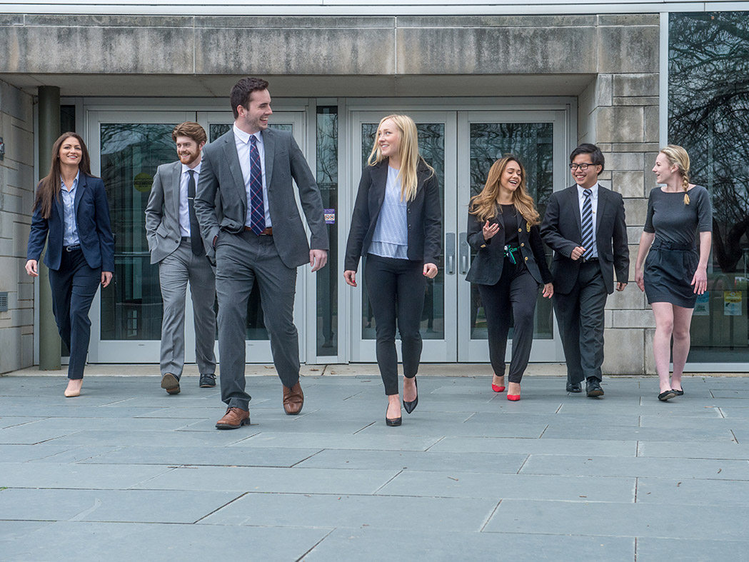 UE Business students leaving the School of Business Administration building.