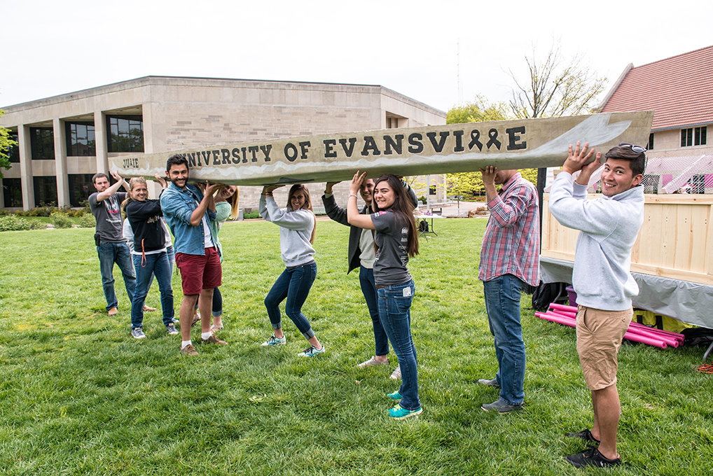 Civil Engineering students living concrete canoe