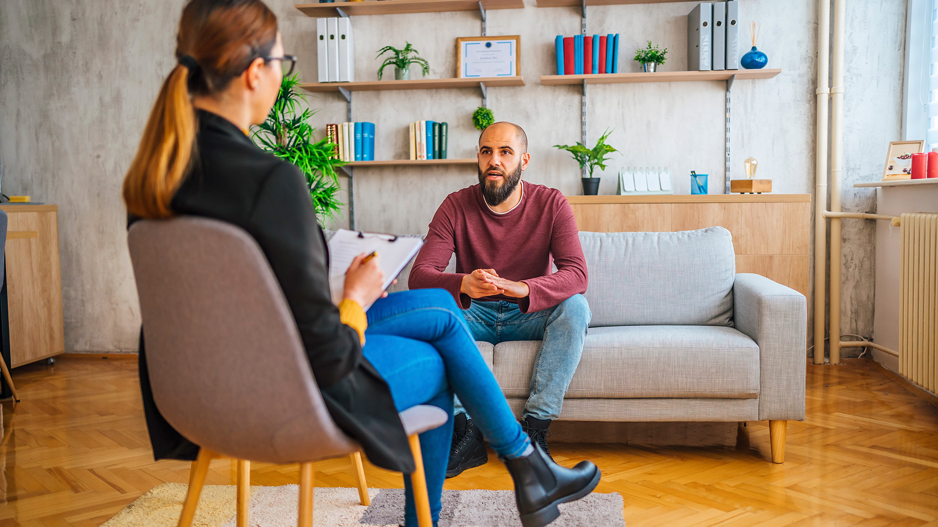 Clinical Psychology Doctor with patient on couch