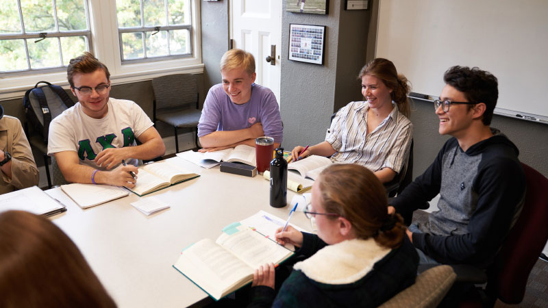 Cognitive Science students at a table