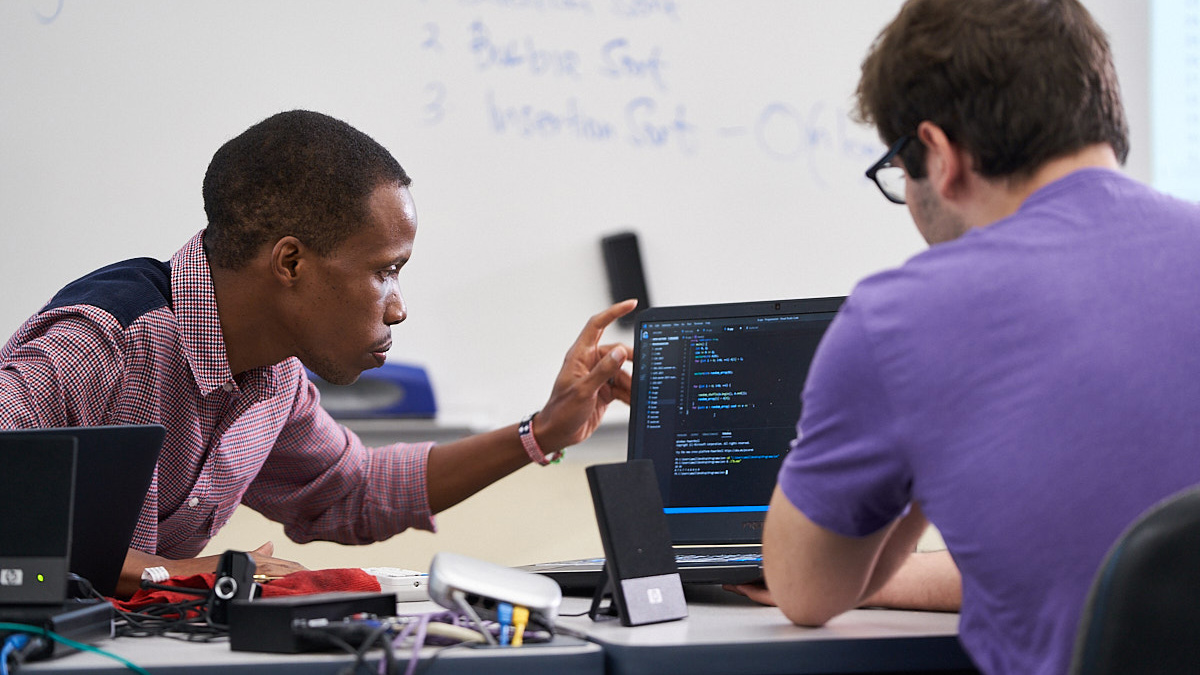 Computer Science students coding