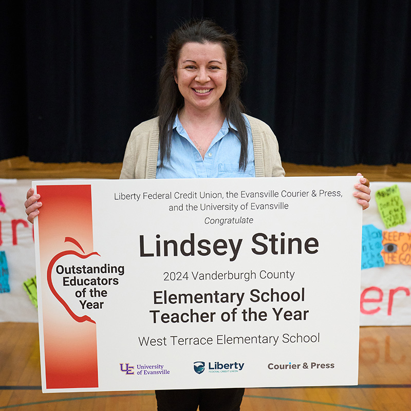 Lindsey Stine with Award