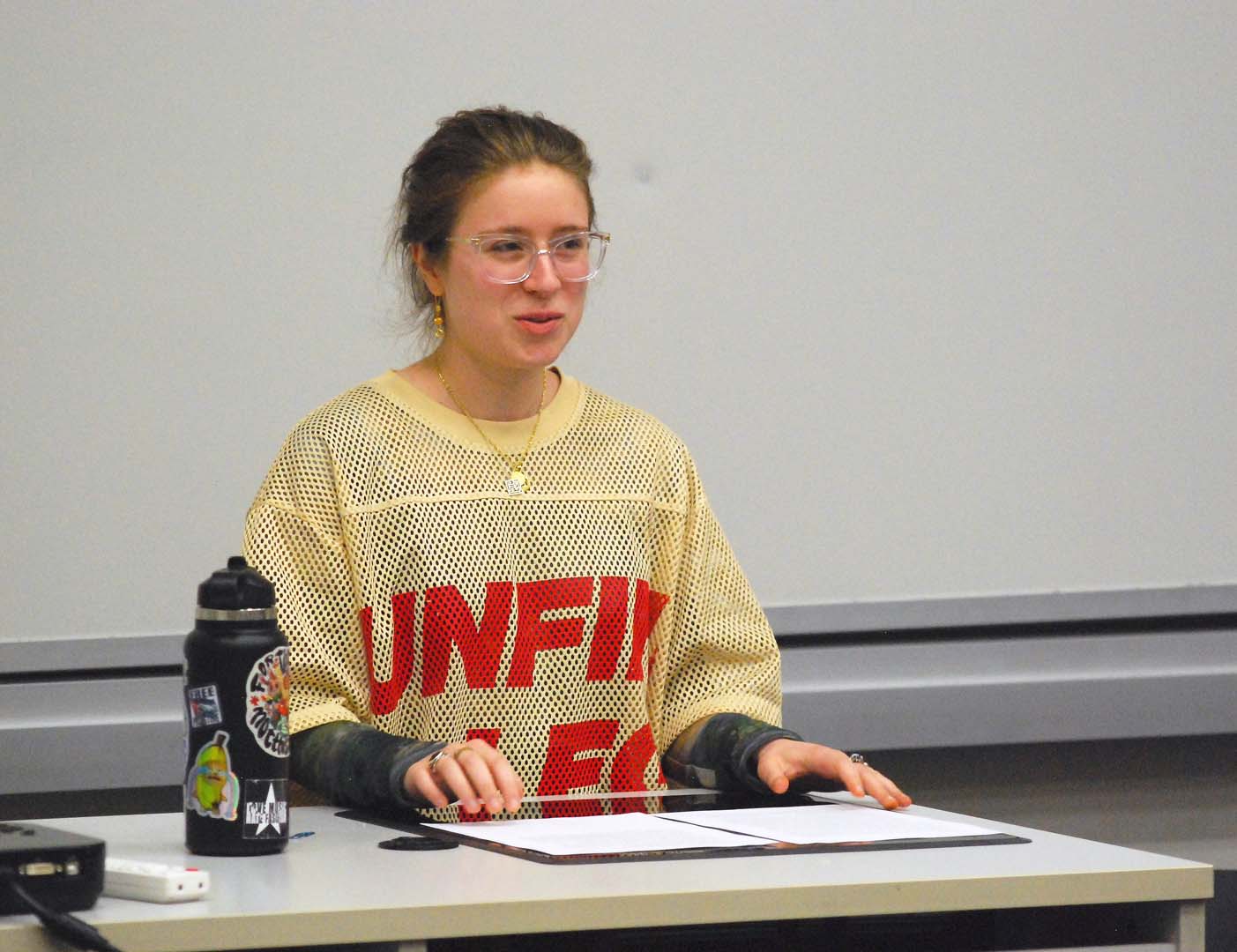 Zorah Mehrzad presents at the Senior Coffee Hour Reading.