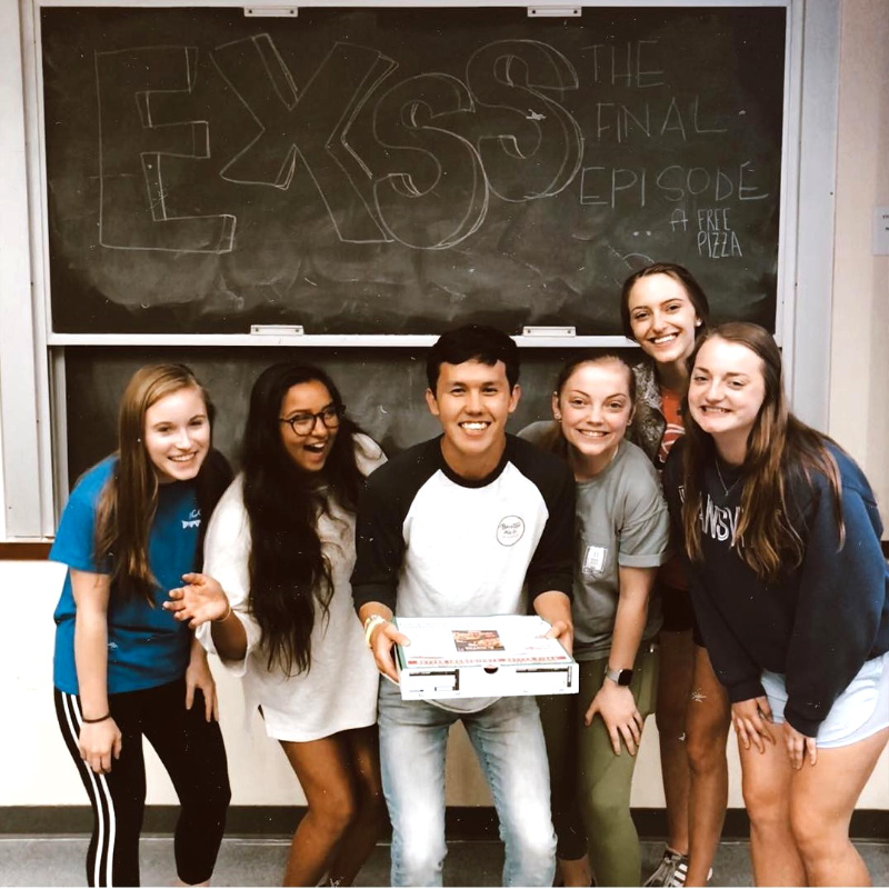 EXSS Club with pizza