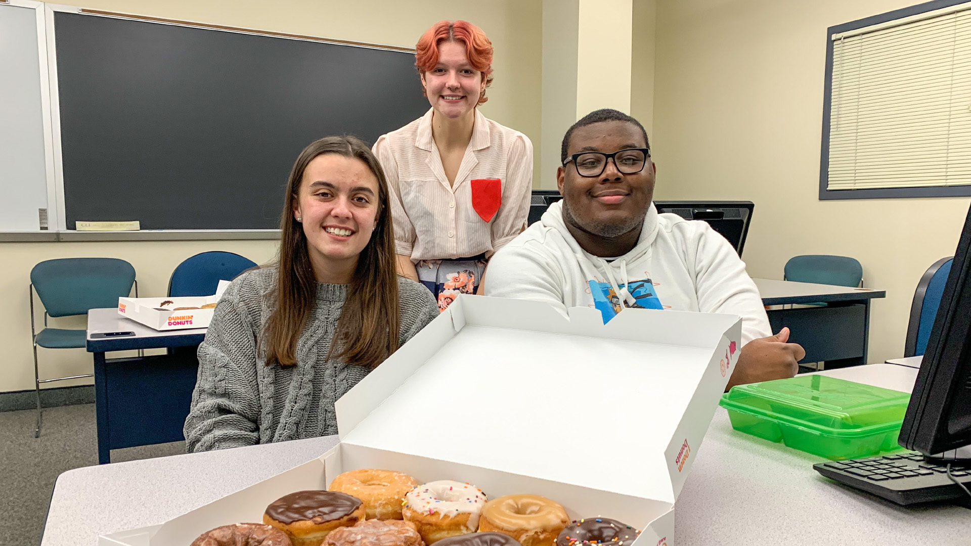 Statistics and Data Science Club members with donuts