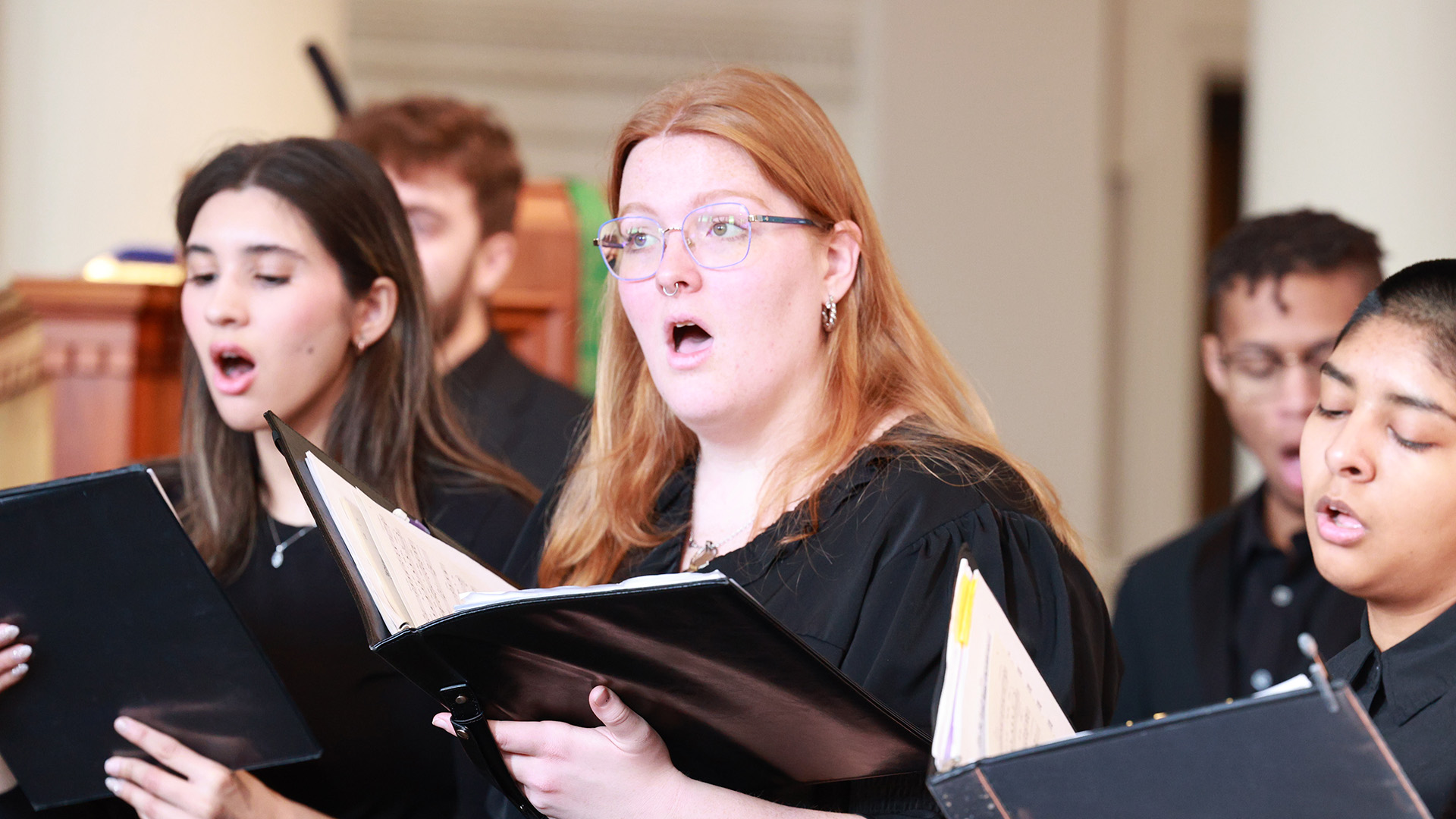 Choir females performing