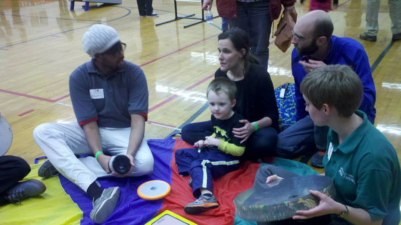 Music therapy students sitting on floor