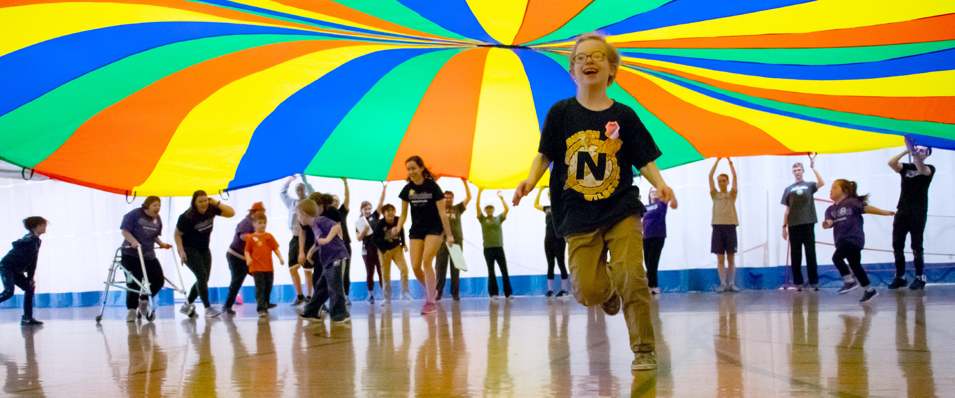 AceBuddies children under parachute