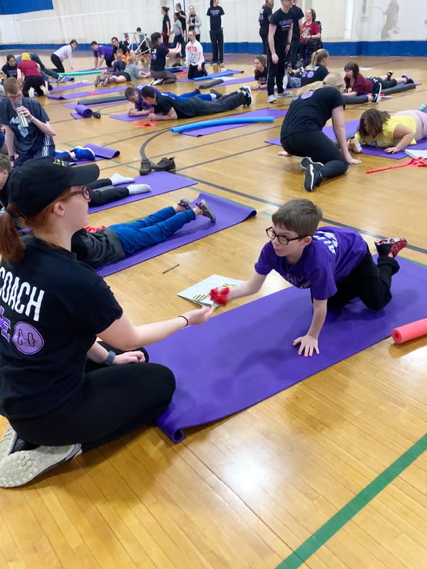 AceBuddies group on purple mats