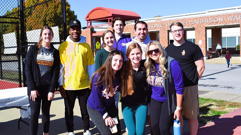PT Club members in front of Harrison High School