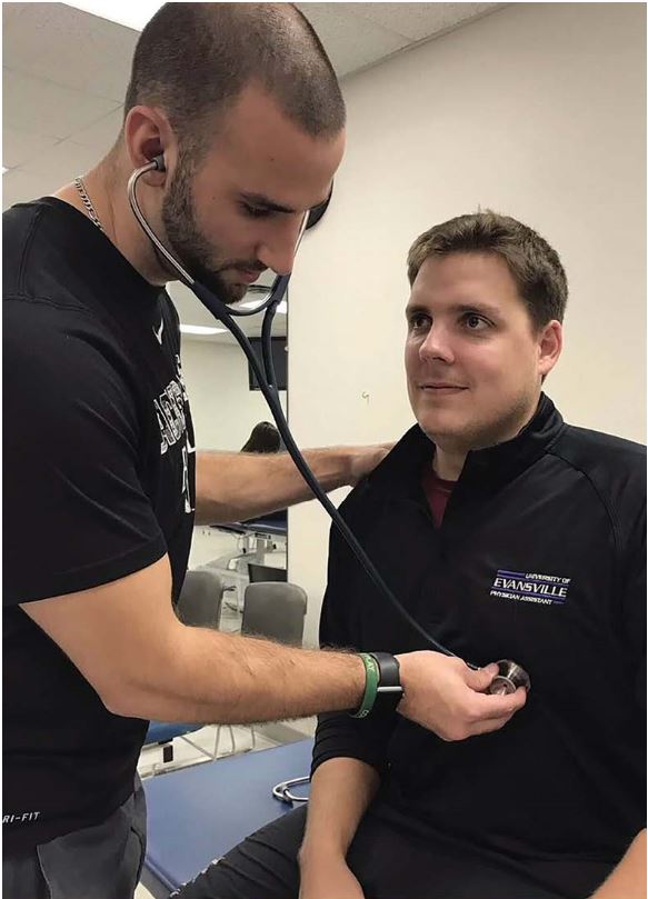 Josh and Pete using stethescope