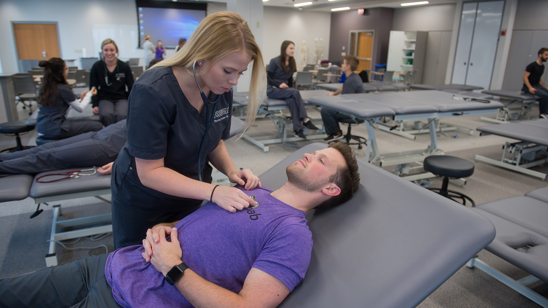 Student with patient reclined