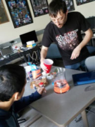 Students filling a fishbowl
