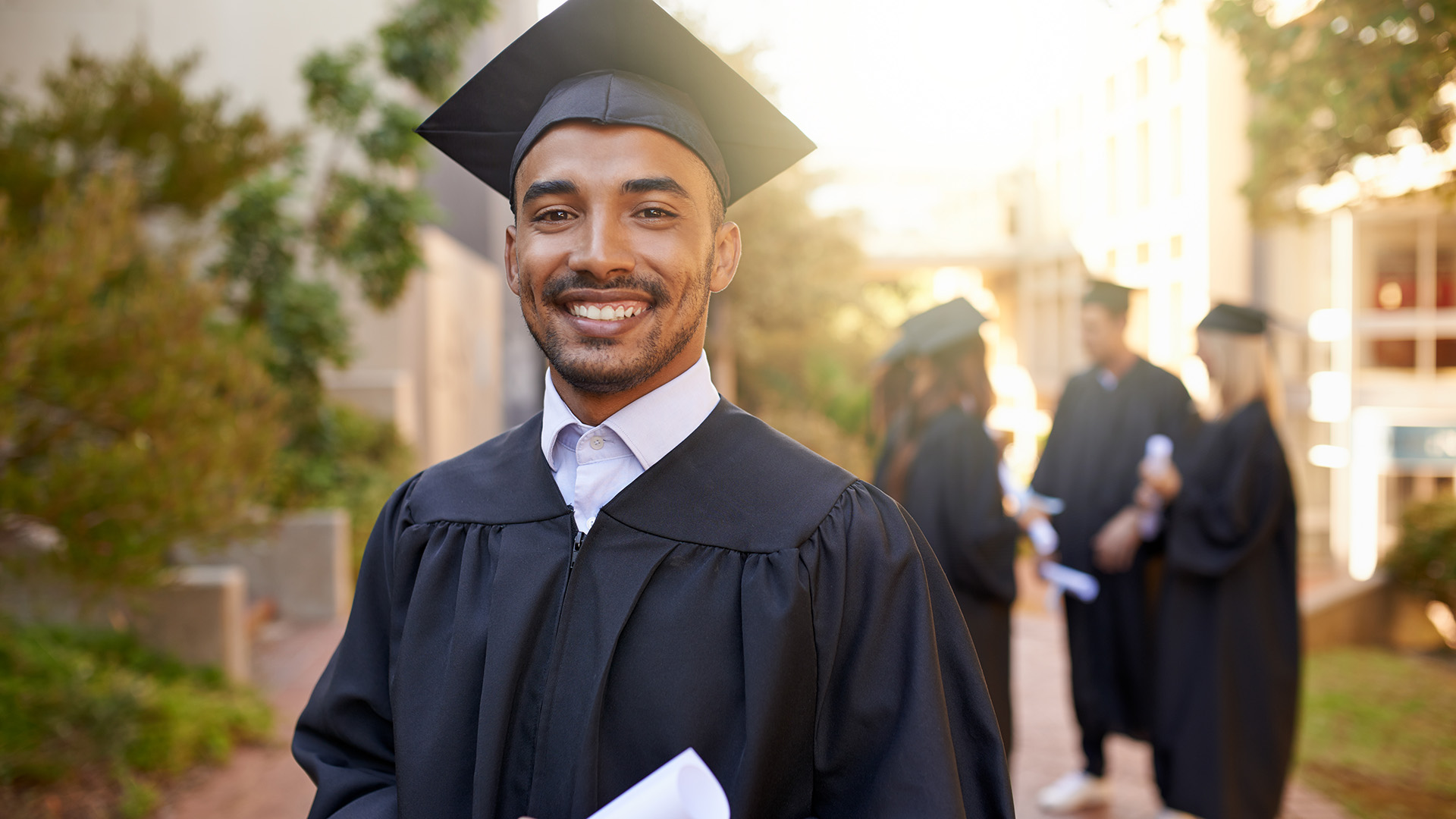 Graduate with diploma