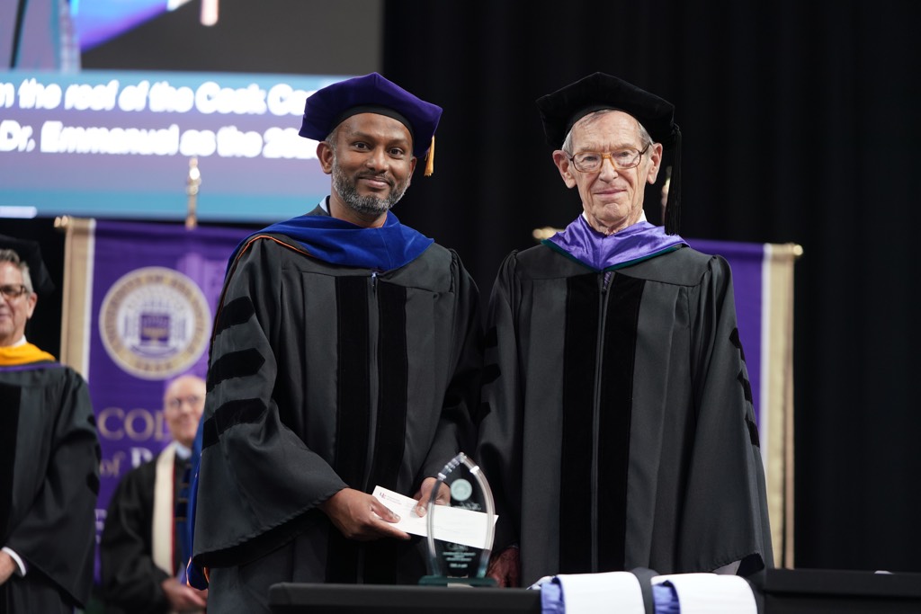 Dr. Suresh Immanuel with award.