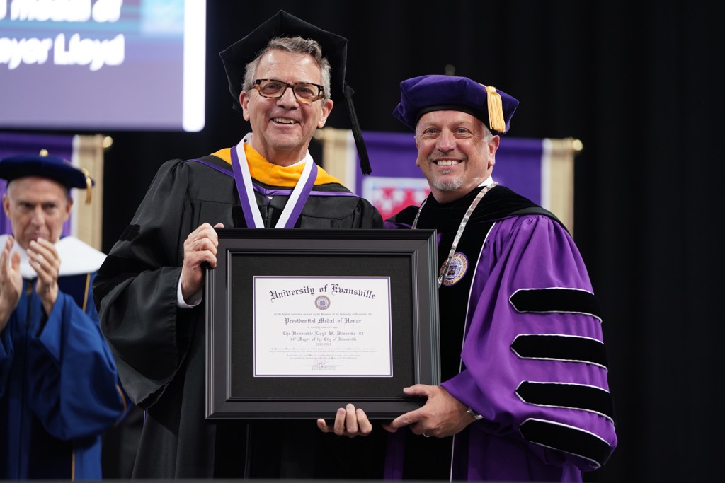 Mayor Lloyd Winnecke with honorary degree.