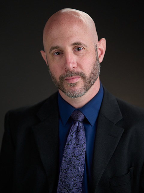 Joe Atkinson headshot