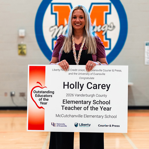 Holly Carey with award