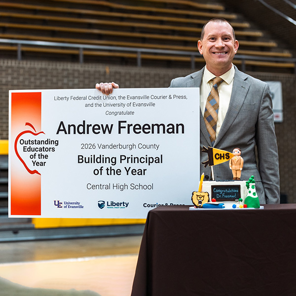 Andrew Freeman with award