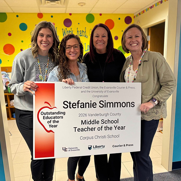 Stefanie Simmons with award