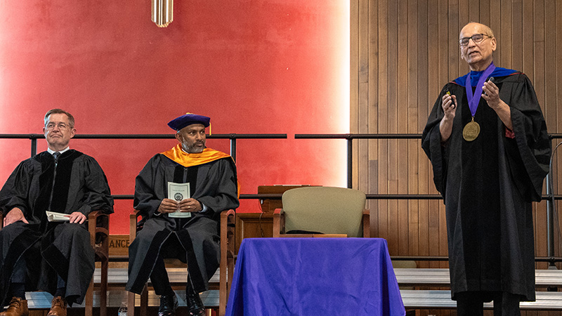 Dr. Kahn speaking in Neu Chapel