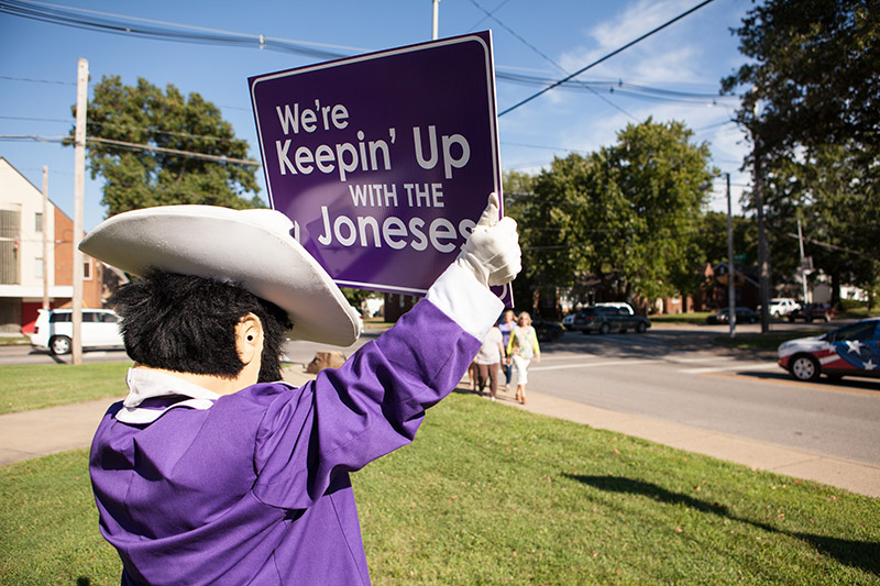 Ace Purple with sign.