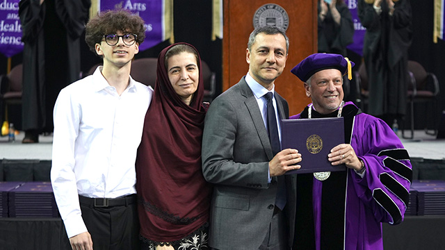 Khan family with award
