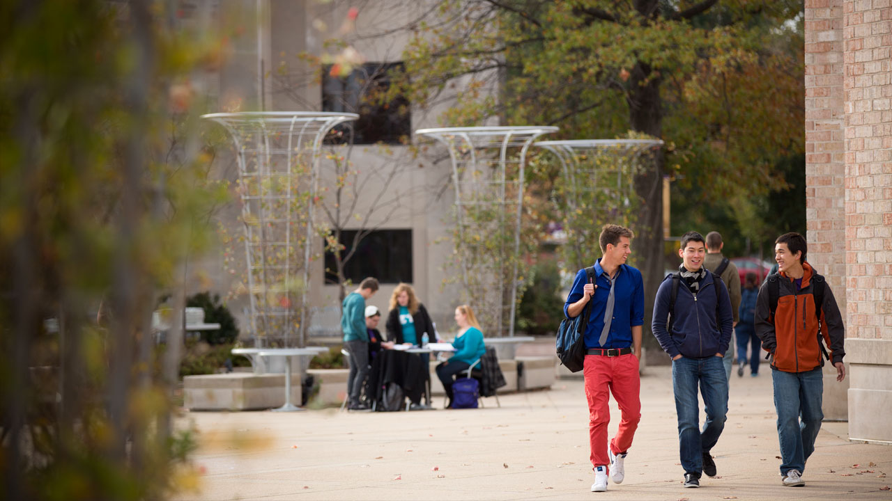 Three students walking to class