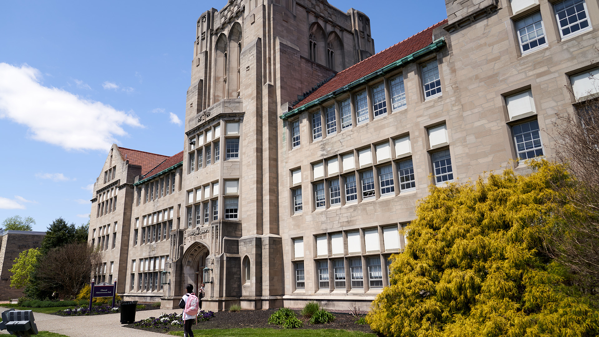 Olmsted Administration Hall up close with blue sky