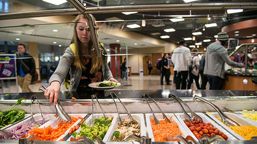 Girl at salad bar