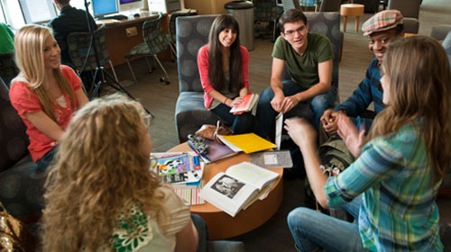 Students talking at a table