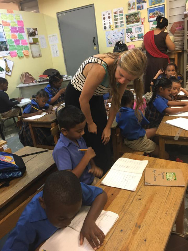 Melinda with school children.