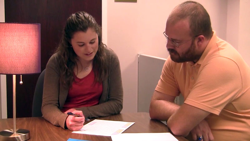 Student with academic advisor